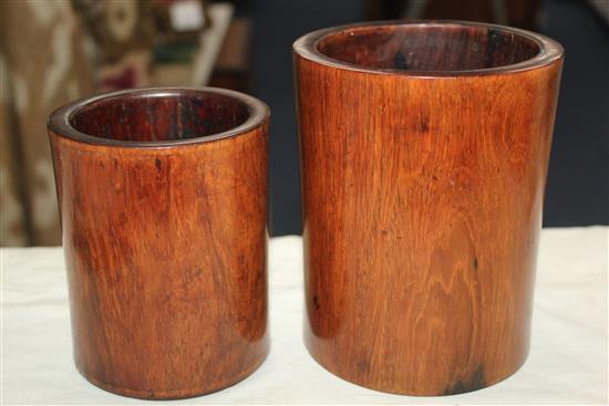 Two Chinese graduated huang huali brush pots, 18th century, 12.5cm and 15.2cm